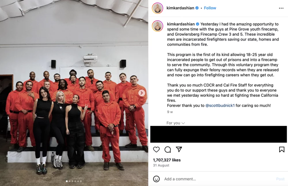 Kim Kardashian in the Pine Grove Youth Conservation Camp posing with incarcerated people