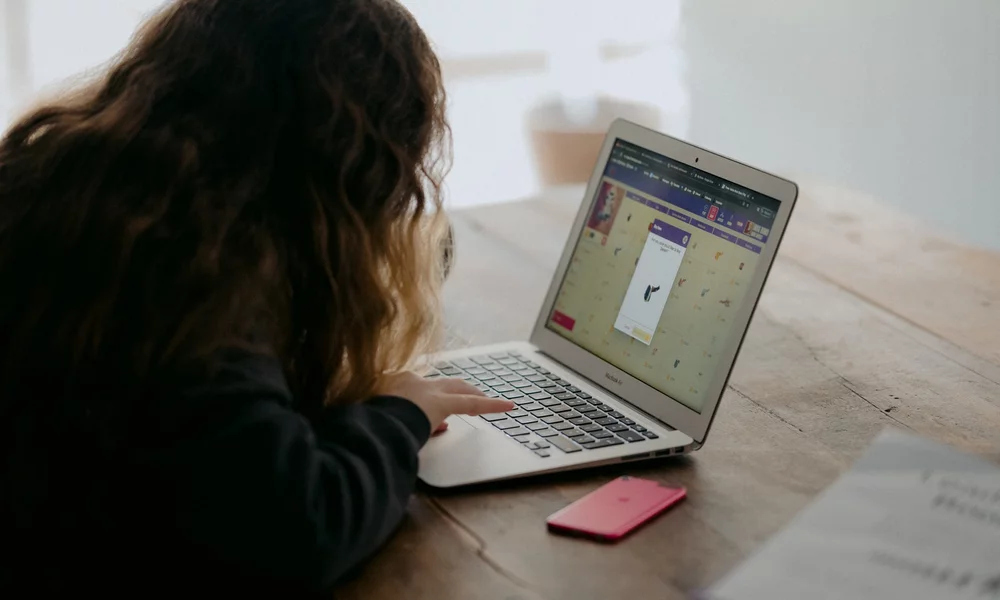 Girl doing her homework on her computer